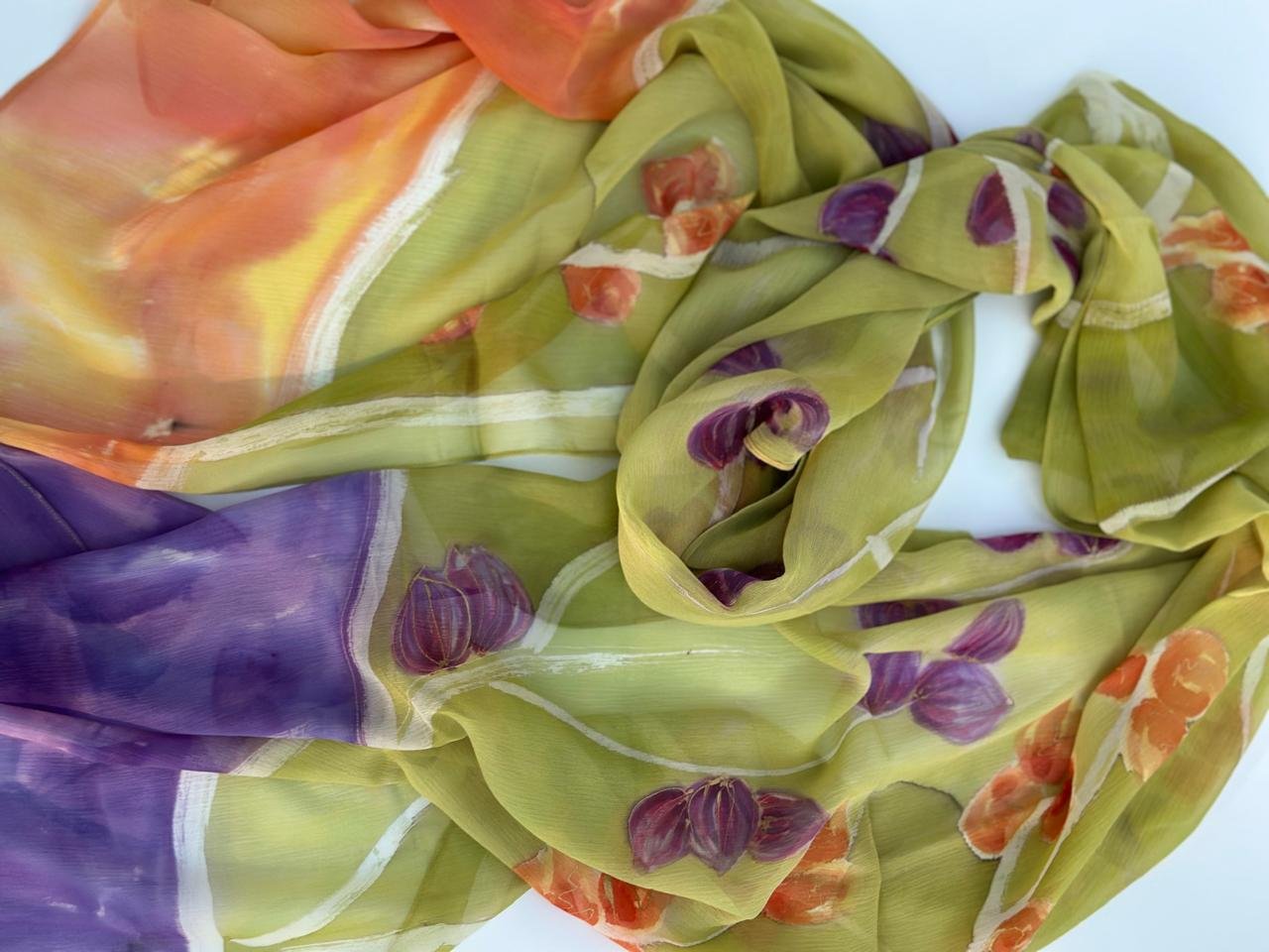 Hand-painted orchids on an olive-green silk scarf